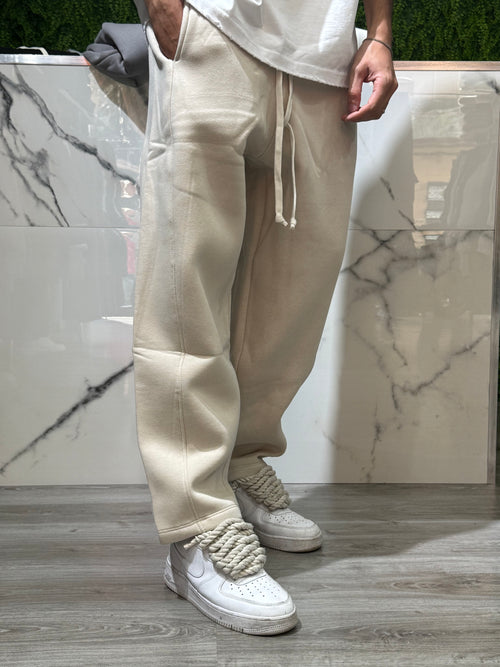 Panta tuta fondo ampio beige